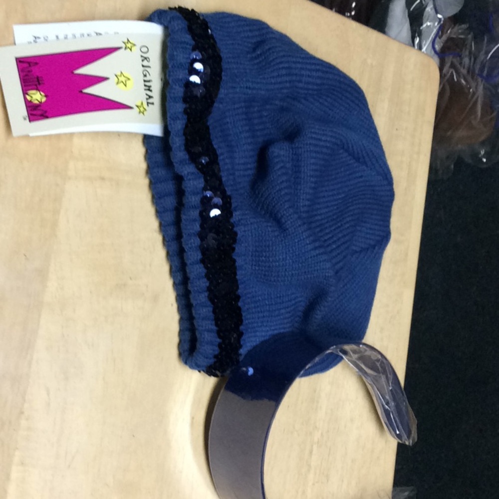 Blue skull hat with sequins and head band.